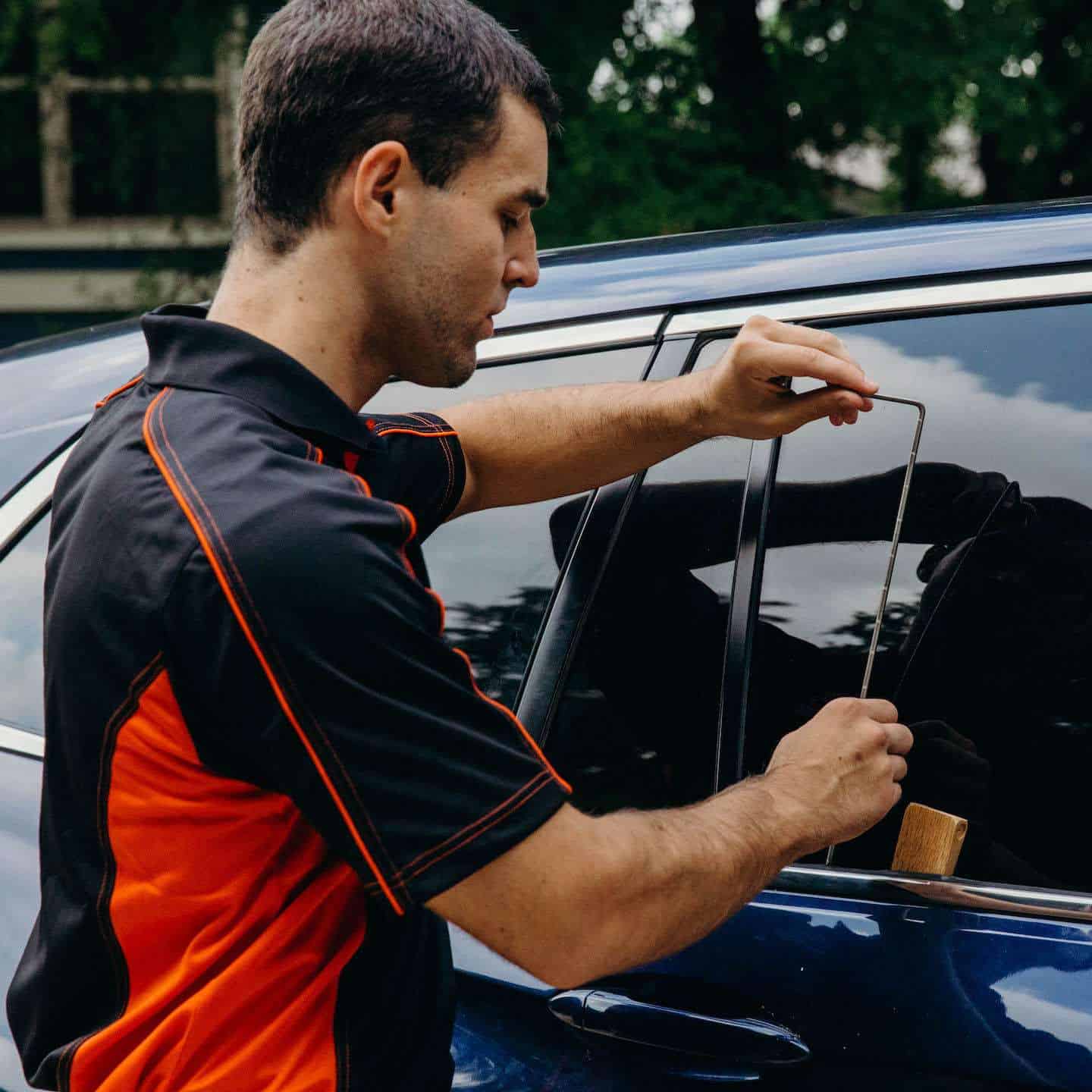 locksmith opening a car