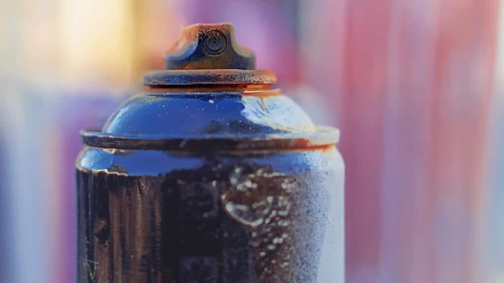 jean-louis-paulin-p1OesvHsSpo-unsplash (1) Black can of spray paint.