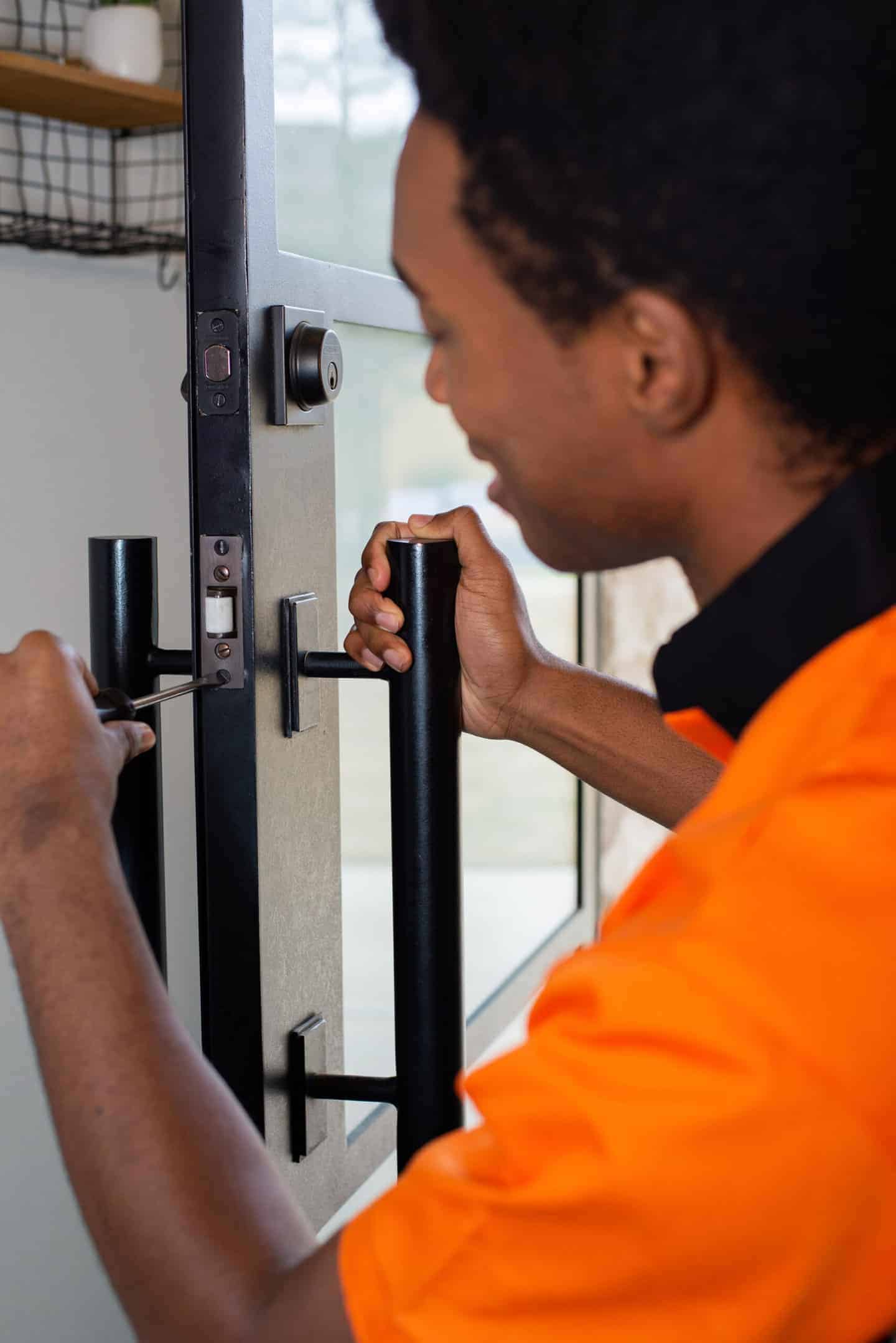 Residential locksmith rekeying home locks in Mobile Alabama